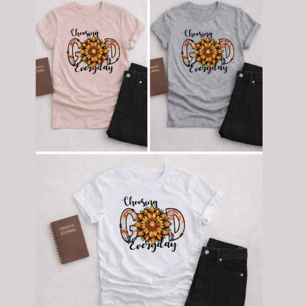 Three shirts in dusty rose, grey, and white with a flower design and text on a white background.